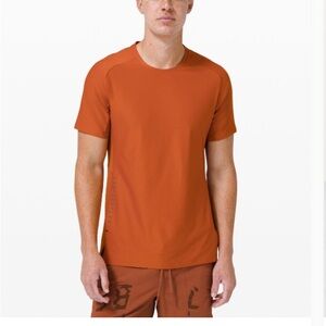 Lululemon License to Train - burnt orange shirt